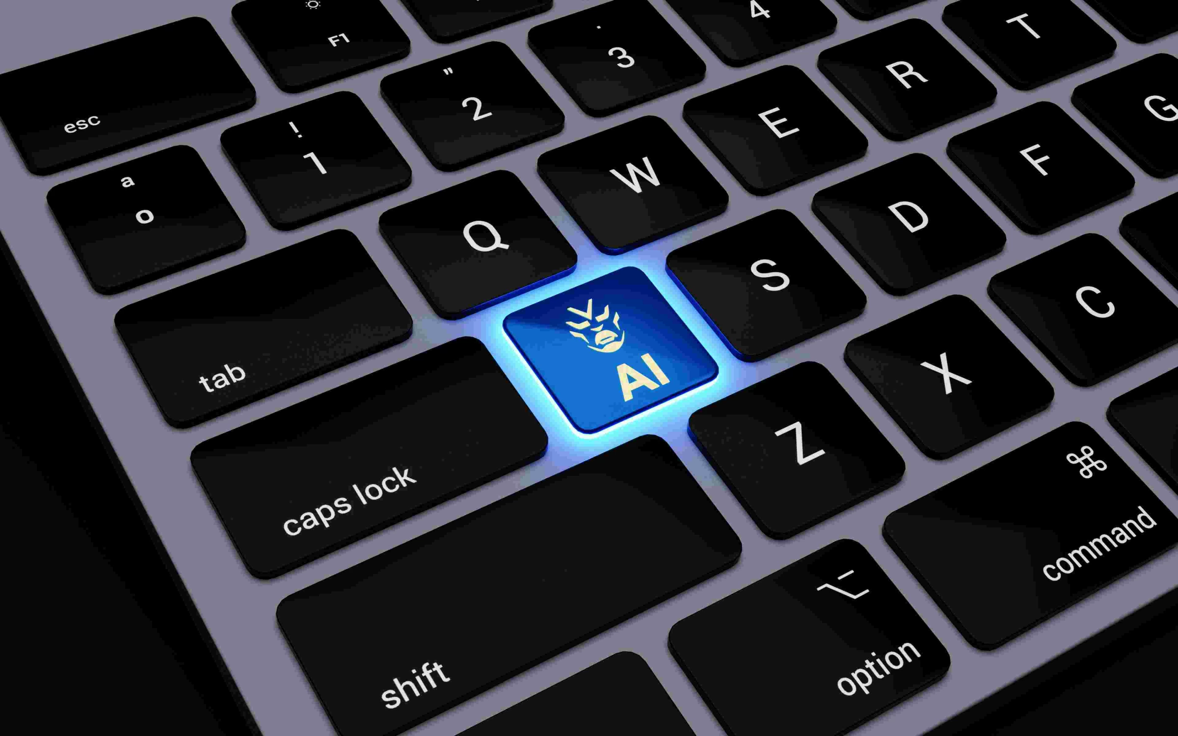 Laptop keyboard with glowing blue AI key
